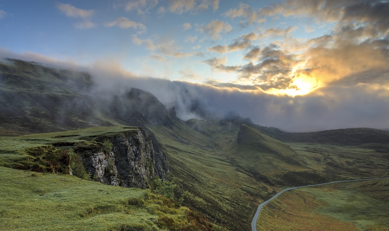 Green mountains with dramatic clouds